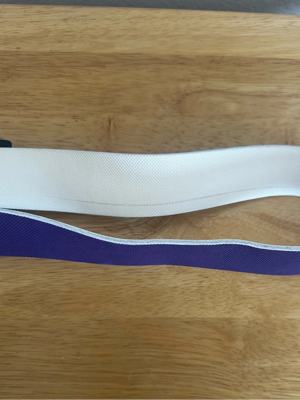 Oakley Belt Buckle with Purple Belt.